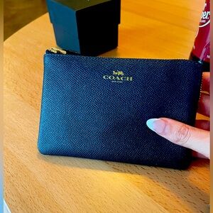 Beautiful COACH zip wristlet - AUTHENTIC. navy blue. Comparable price is $78.00